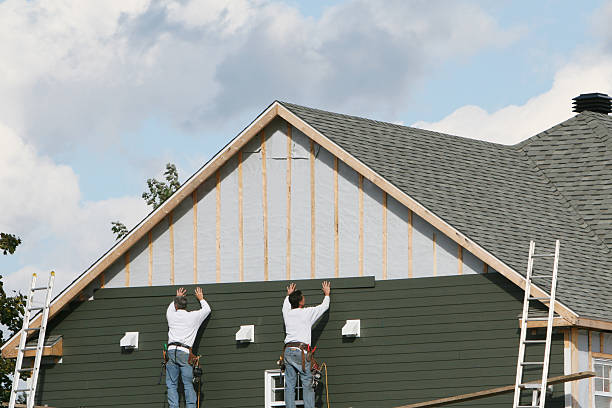 Professional Siding technician working in Nesconset, NY